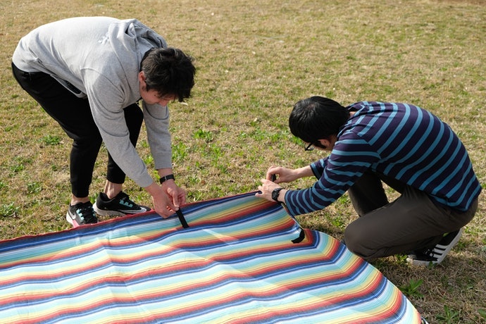 水や汚れに強く機能性は高い。持ち手が一体型で展開・収納もスムーズ