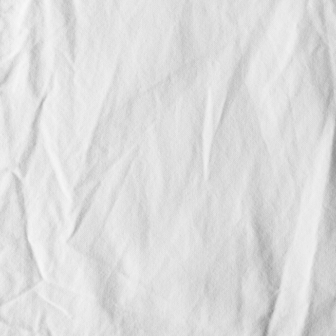前身頃の深いシワはほとんど取れたものの、細かいシワが残る